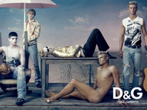 D&G is using sex to grab your attention. Hopefully, you'll buy their clothes, which he isn't wearing. 